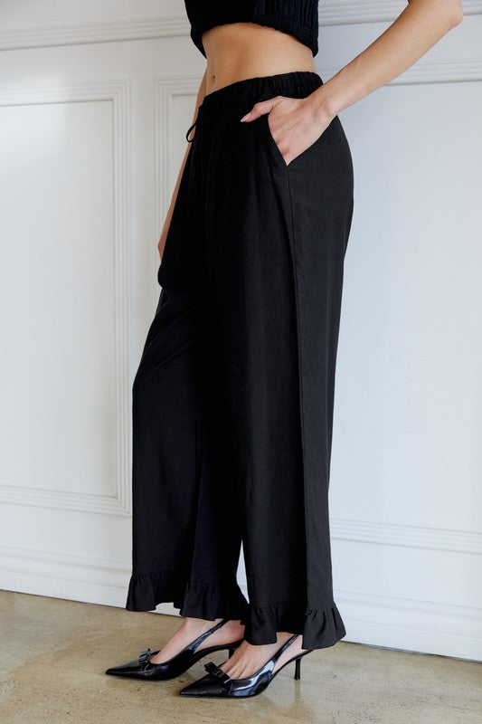 STRAPLESS TOP AND RUFFLE DETAIL PANTS SET